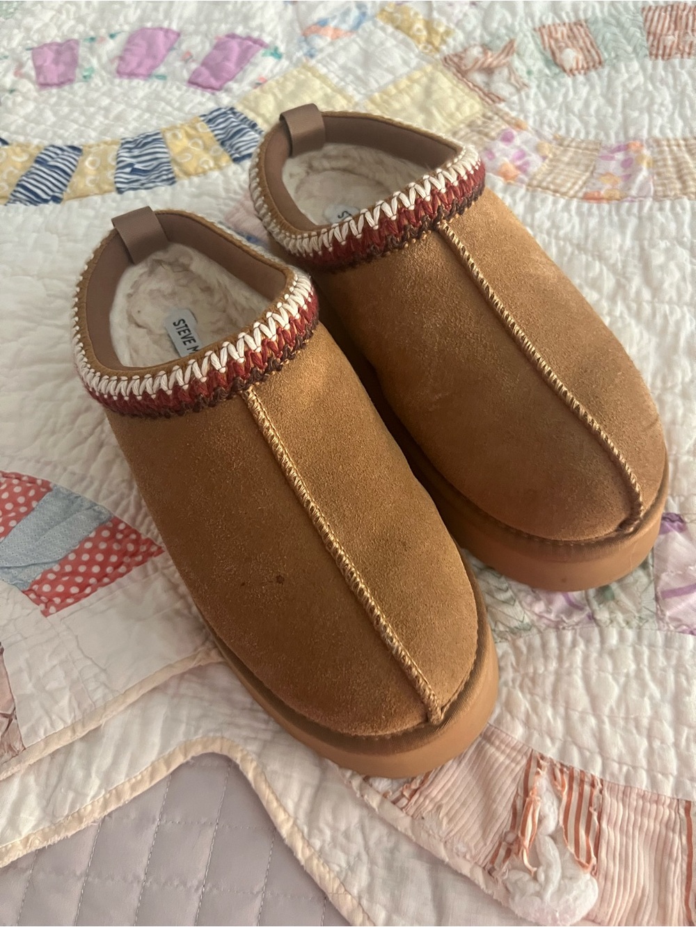 Steve Madden women’s Cozy Slip-On Suede Clogs in Chestnut